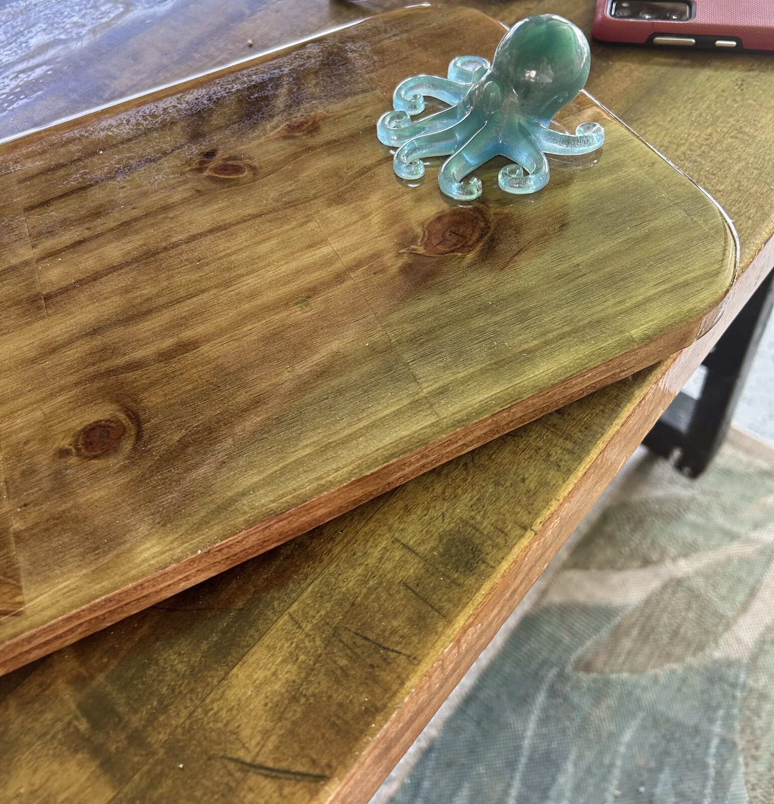 Handcrafted charcuterie boards with glass octopus detail by Beau Light